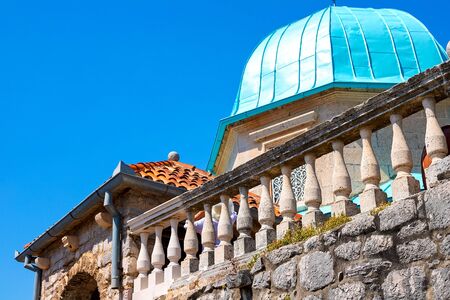Amazing view of the church with a blue bath on the island of the Virgin on a reef in the Bay of Kotor, Montenegro, August 2018の写真素材