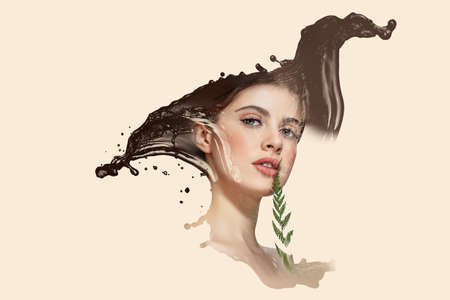 Reflection of a beautiful brunette girl in a water splash on a beige background.の写真素材