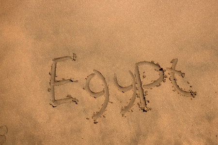 Beach. Shore of the Red Sea. Inscription on yellow sand. Egypt.の写真素材