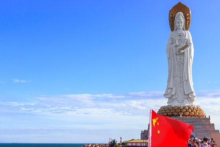 The Guanyin statue on Hainan Island, China. A majestic Buddhist monument by the seaの写真素材