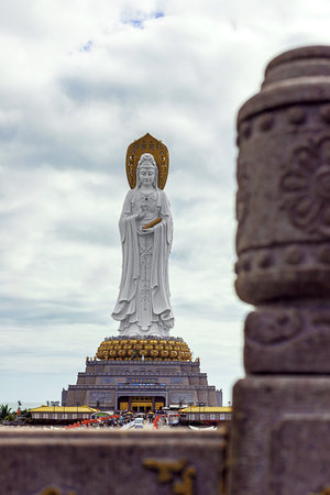 The Guanyin statue on Hainan Island, China. A majestic Buddhist monument by the seaの写真素材