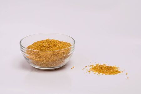 Wheat groats in a plate on a white background. Groats in a small plate. Healthy breakfast on a white background.の写真素材