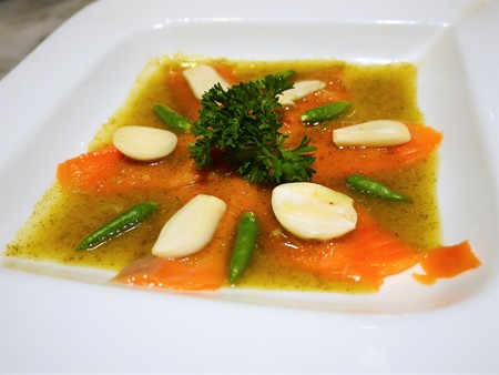 Spicy Salmon salad with Thai herbs in special sauceの写真素材