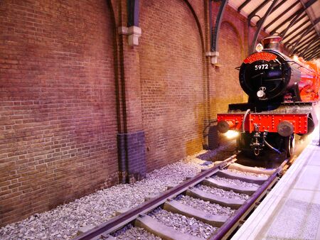 Leavesden, London, UK - DECEMBER 19th 2017: The Hogwarts Express and platform in the Warner Brothers Studio tour 'The making of Harry Potter'.のeditorial素材