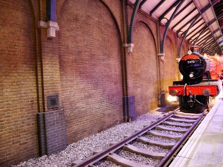 Leavesden, London, UK - DECEMBER 19th 2017: The Hogwarts Express and platform in the Warner Brothers Studio tour 'The making of Harry Potter'.のeditorial素材