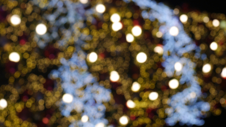 Abstract of blurred bokeh background. Blurred bokeh background. Bokeh from Christmas light party. Holiday. Christmas celebration blurred light.の写真素材