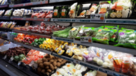 Blurred perspective vegetables shelf, Supermarket Background. Blurred organic shelf background.の写真素材