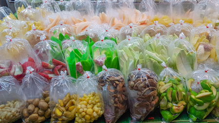 Various kind of Thai packed fruits ready to serve.の写真素材