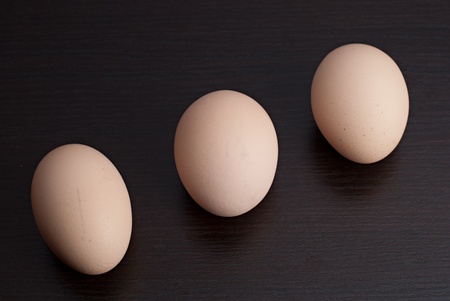 Eggs on a dark backgroundの写真素材