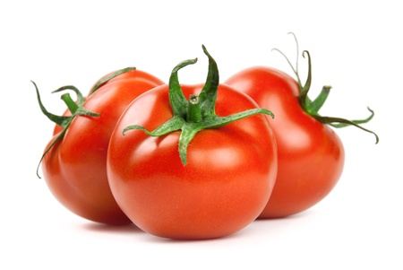 Ripe red tomatoes on a white backgroundの写真素材