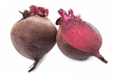Beet purple vegetable with shadow on white backgroundの写真素材
