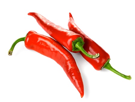 3 red chili peppers isolated on a white backgroundの写真素材