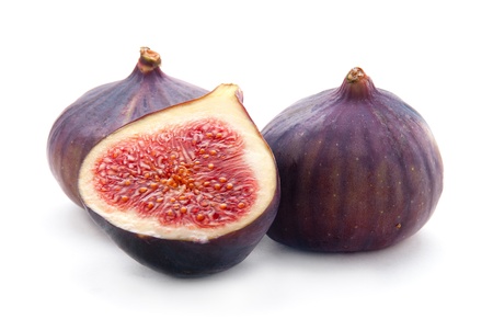 Two Figs and Slice Isolation on White Backgroundの写真素材