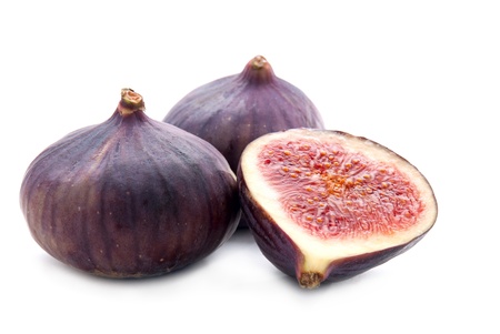 Two Figs and Slice Isolation on White Backgroundの写真素材