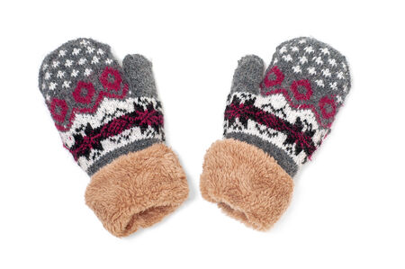 a pair of baby gray gloves with pattern on white backgroundの写真素材