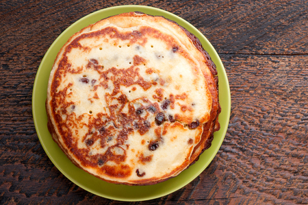 A stack of pancakes on a plateの写真素材