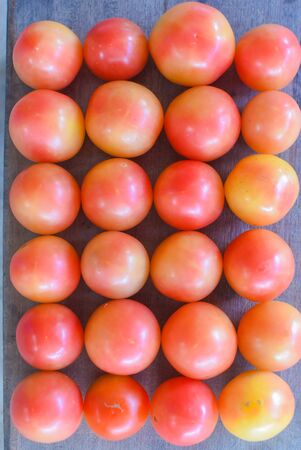 Fresh red tomatoes ready for saleの写真素材