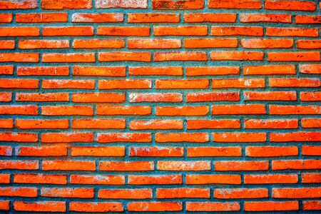 Orange brick wall backgroundの写真素材