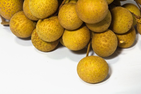 Close up of many longan over white background 