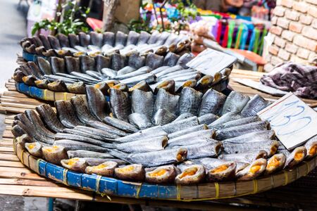Closeup dried fish, trichogaster pectoralis in Thailand local market.の写真素材