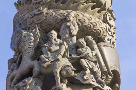 Chinese dragon stone statue Split on sky backgroundの写真素材