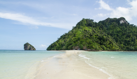 krabi wide shot of isolated paradise beach with calm clear waters. Ocean nature tranquility backgroundの写真素材