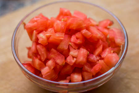 Chopped red tomato cooking ingredient food raw vegetableの写真素材