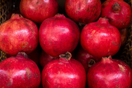 Pomegranate fruit on the market, closeup of photoの写真素材