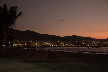 Sunset on the beach in the town of Benidorm, Spainの写真素材