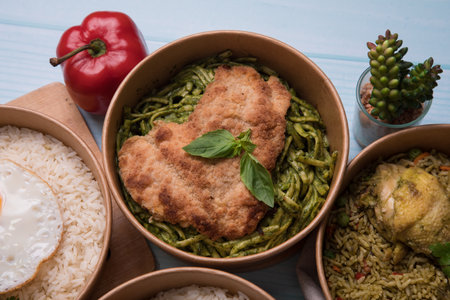 Healthy food concept. Green curry with fried chicken, rice and vegetablesの写真素材