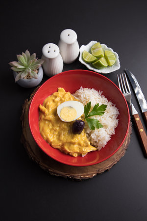 Aji de gallina peuvian food on black backgroundの写真素材