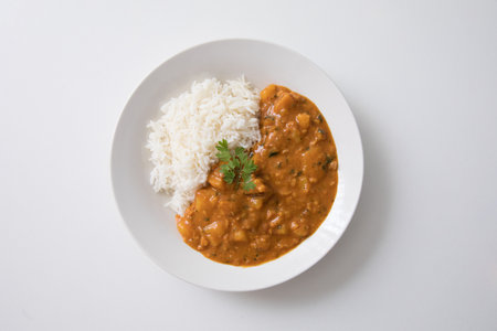 Indian Curry with Rice on white background. Selective focus point.の写真素材