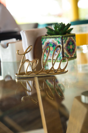 golden crown on glass table in coffee shop, shallow DOFの写真素材