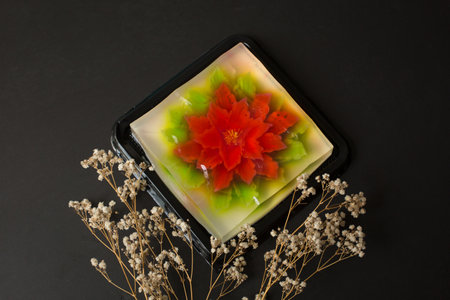 Porcelain jasmine jelly with flower on black background