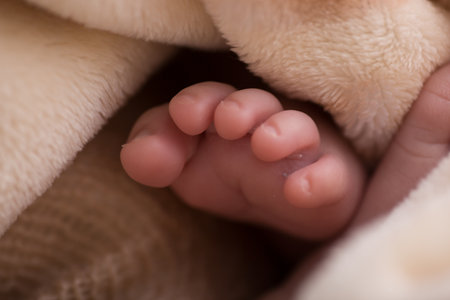 Cute tiny newborn baby foot close up. Newborn concept.の写真素材