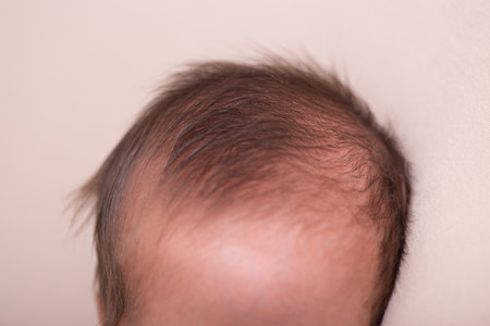 Newborn baby head close-up. The concept of a healthy lifestyle.の写真素材