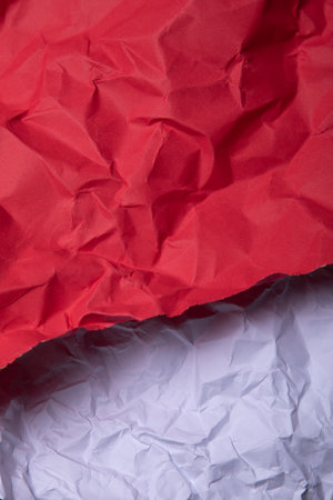 Red crumpled paper background. Close up. Copy space.の写真素材