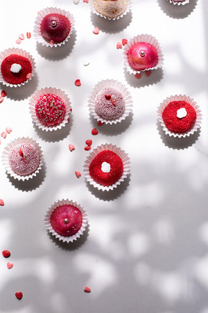 Brigadeiro traditional Brazilian Brasil sweet dessert on a white background with shadows from the windowの写真素材