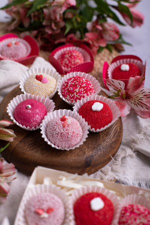 Brasilian brazilian Brasil food sweet treat pastry gourmet Cake pops with red and white icing. Selective focus.の写真素材