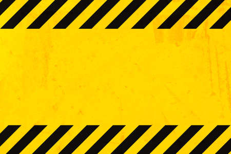 Grunge yellow and black diagonal stripes. Industrial warning background, warn caution, construction,...