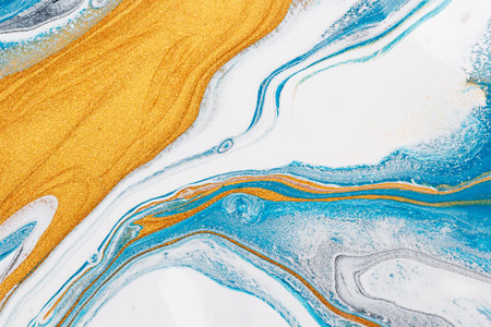 Gold and blue liquid marble background. Used in design for skin tile ,wallpaper, interiors backdrop....