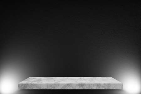 Product showcase with spotlight. Black studio room background. Use as montage for product displayの写真素材