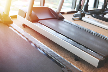 Treadmills for fitness cardio training. gym interior with equipment.
