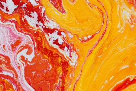 Abstract background. Swirls of marble. Natural Luxury. Red and yellow paint backgroundの写真素材
