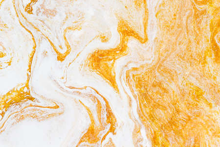 Gold liquid marble background. Used in design for skin tile ,wallpaper, interiors backdrop. Picture...