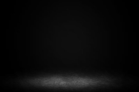 Product showcase with spotlight. Black studio room background. Use as montage for product displayの写真素材