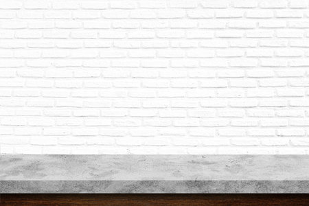 Stone table and white brick wallの写真素材