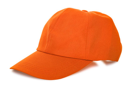 Orange baseball cap isolated on white backgroundの写真素材