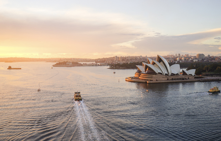 The Opera House, Landmark of Sydney city CBD on Harbour waterfront around Circular Quay in warm light of morning sun under blue sky. Australia : 01/04/18のeditorial素材