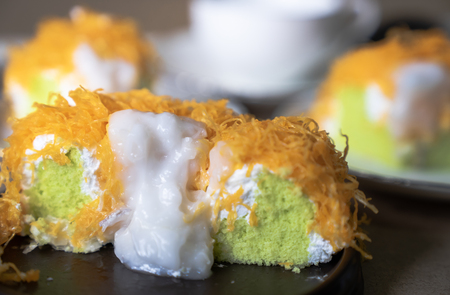 close up selective focus piece of  Gold Egg Yolk Thread Cake , or  'Cake Foi Tongの写真素材